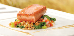 Tea-cured Wild Salmon with Wilted Summer Greens, Rye Berry Salad, and Mustard Vinaigrette