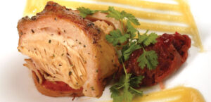 Thyme-Roasted Rack of Pork with Maple Yams and Pear Compote