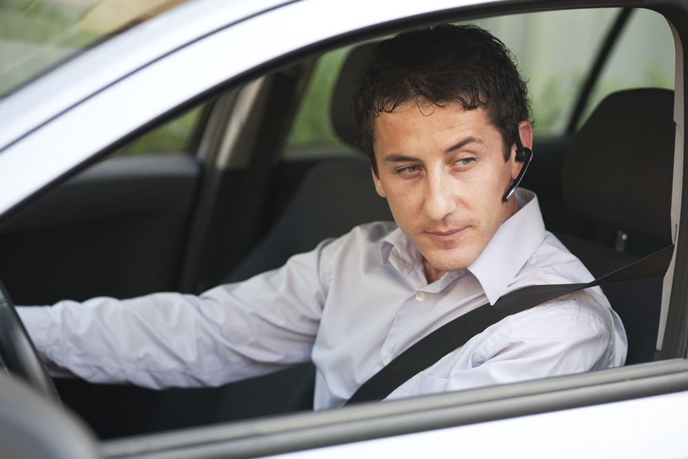 Hands-free Conversation While Driving Challenges the Brain