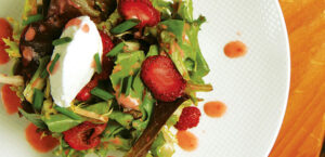 Organic Mixed Green Salad with Strawberries, Goat Cheese, and Hazelnuts