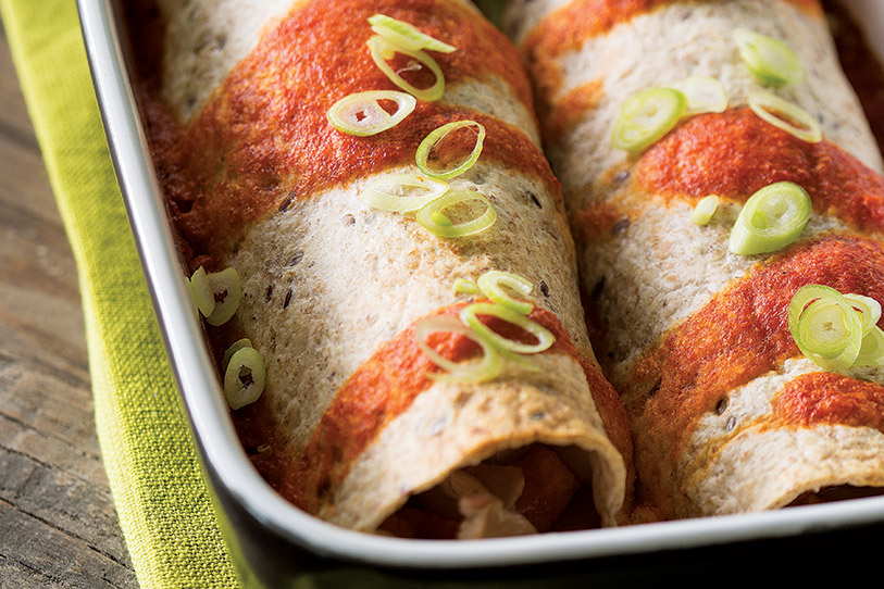 Sweet Potato, White Bean, and Smoked Cheddar Enchiladas with Roasted Red Pepper Sauce