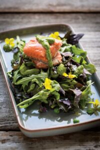 Super-Green Salmon Pesto Salad with Baby Kale, Arugula, and Peas