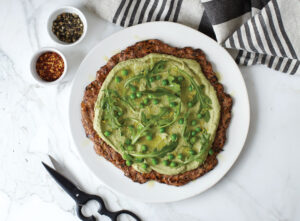Zucchini Pizza Crust With Lemony Pea Pesto