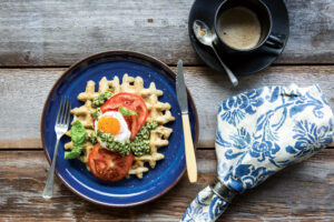 Chickpea Waffles With Tomatoes, Fried Egg, and Basil Sauce