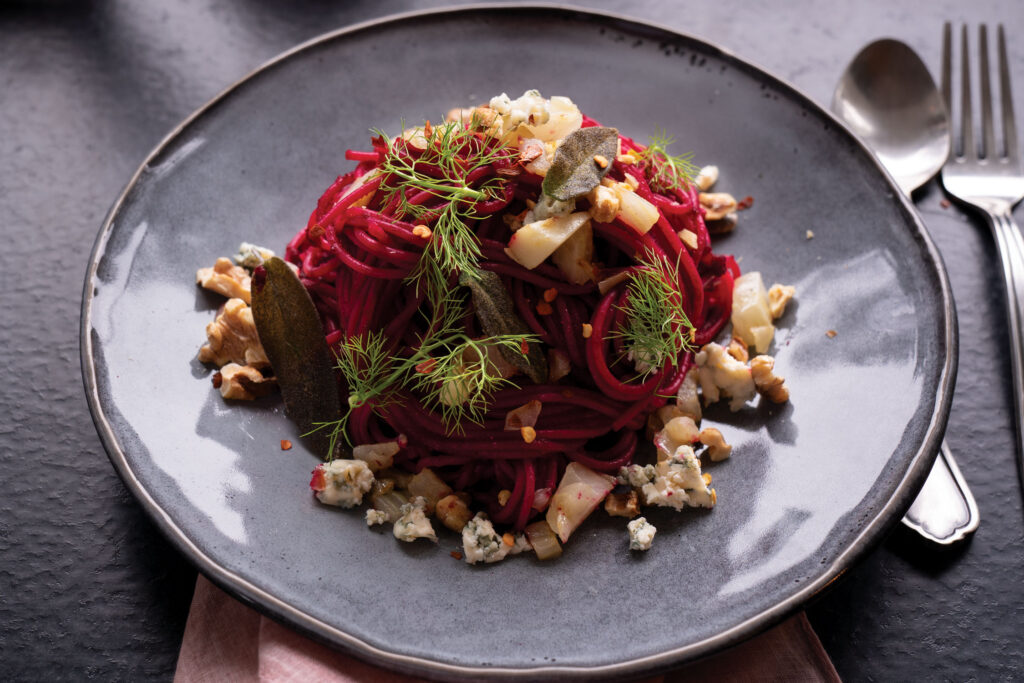 Rosy Beet Spaghettini with Toasted Walnuts, Crumbled Blue Cheese, and Crisped Sage
