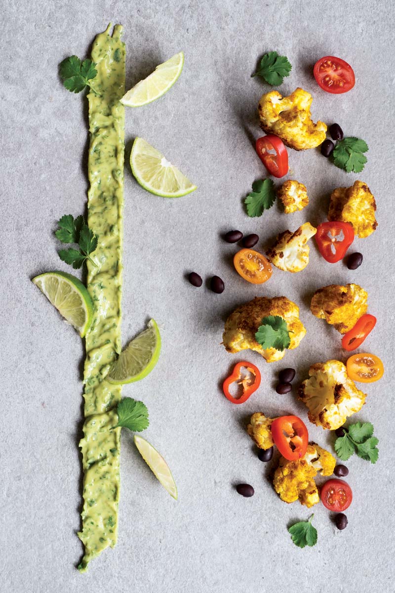 Cauliflower and Black Bean “Nachos” with Creamy Avocado Dip