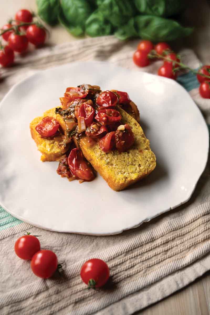 Cornbread with saucy tomatoes