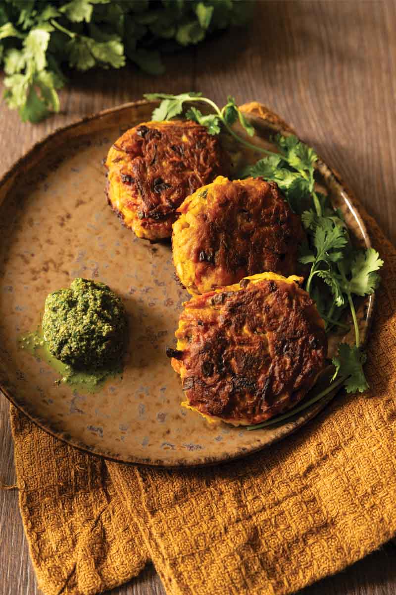 Crispy sweet potato patties with spicy cilantro chutney